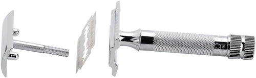 MERKUR 34C with the top cap removed and a blade positioned for fitting